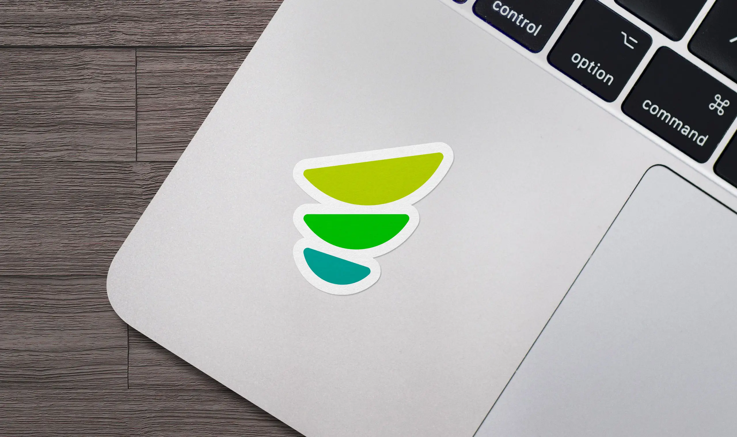 Foodstack sticker on a laptop, demonstrating everyday branding usage.