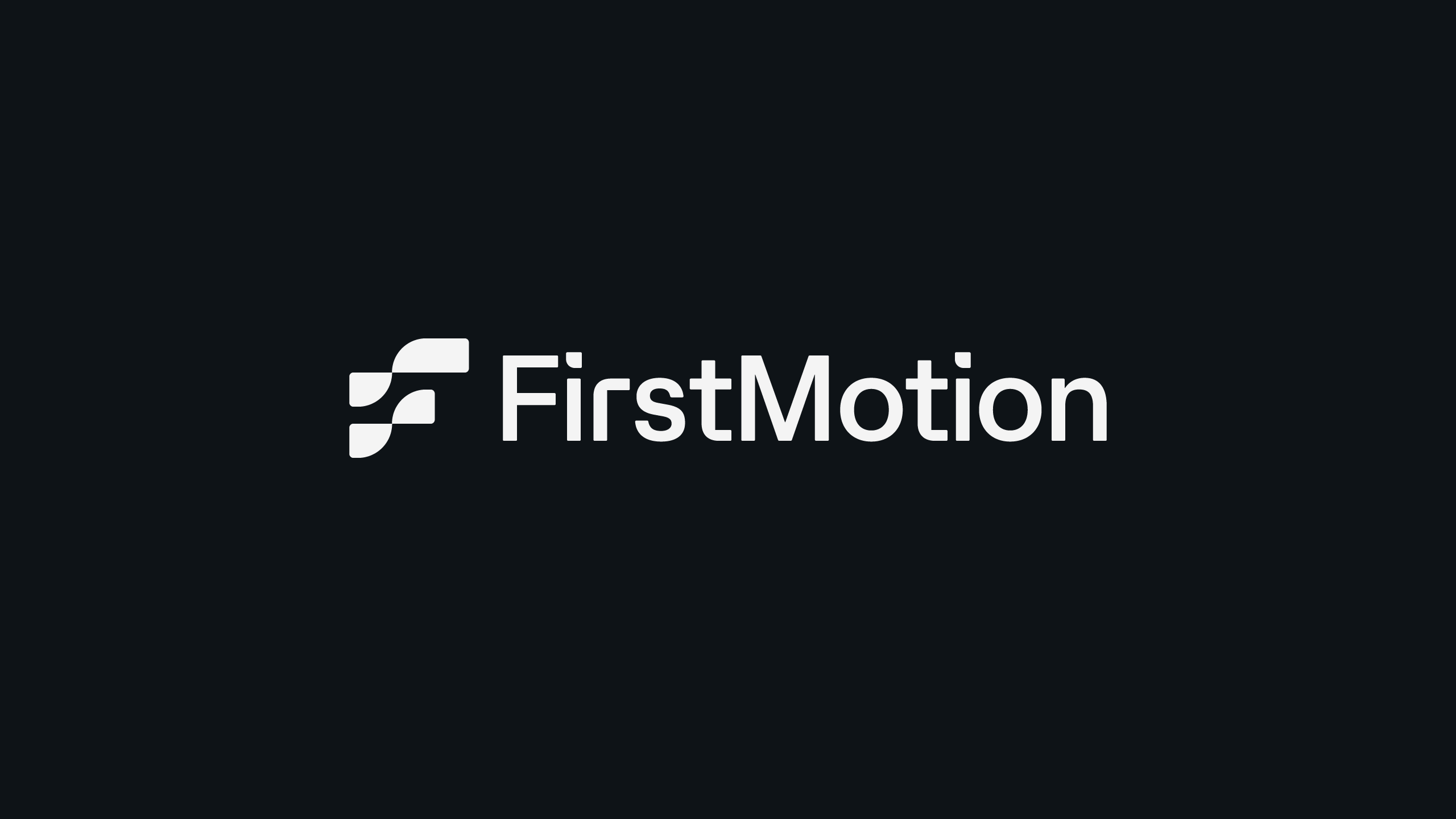 FirstMotion logo in single-color white reversed on a dark background