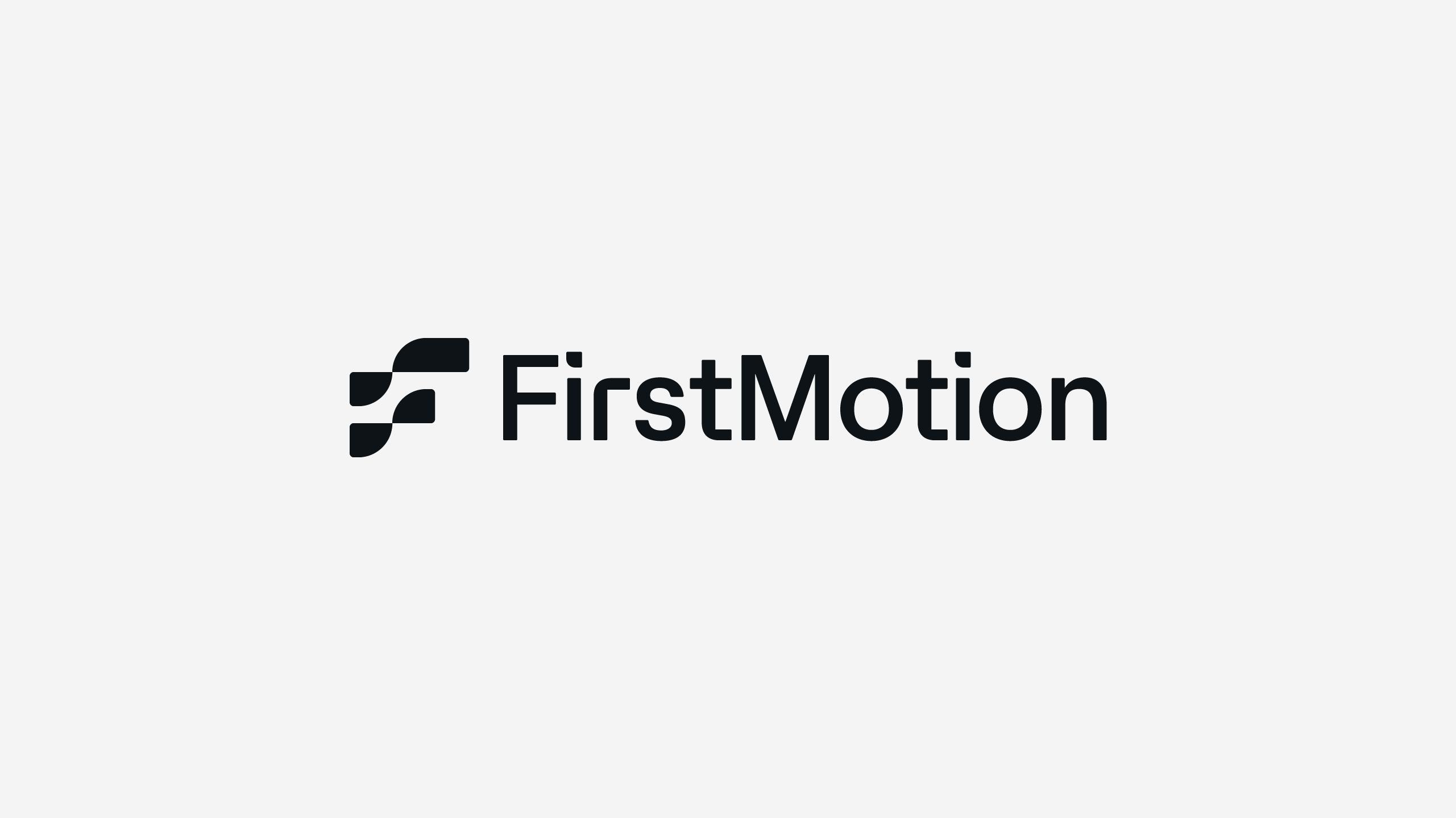 FirstMotion logo in single-color dark on a light gray background