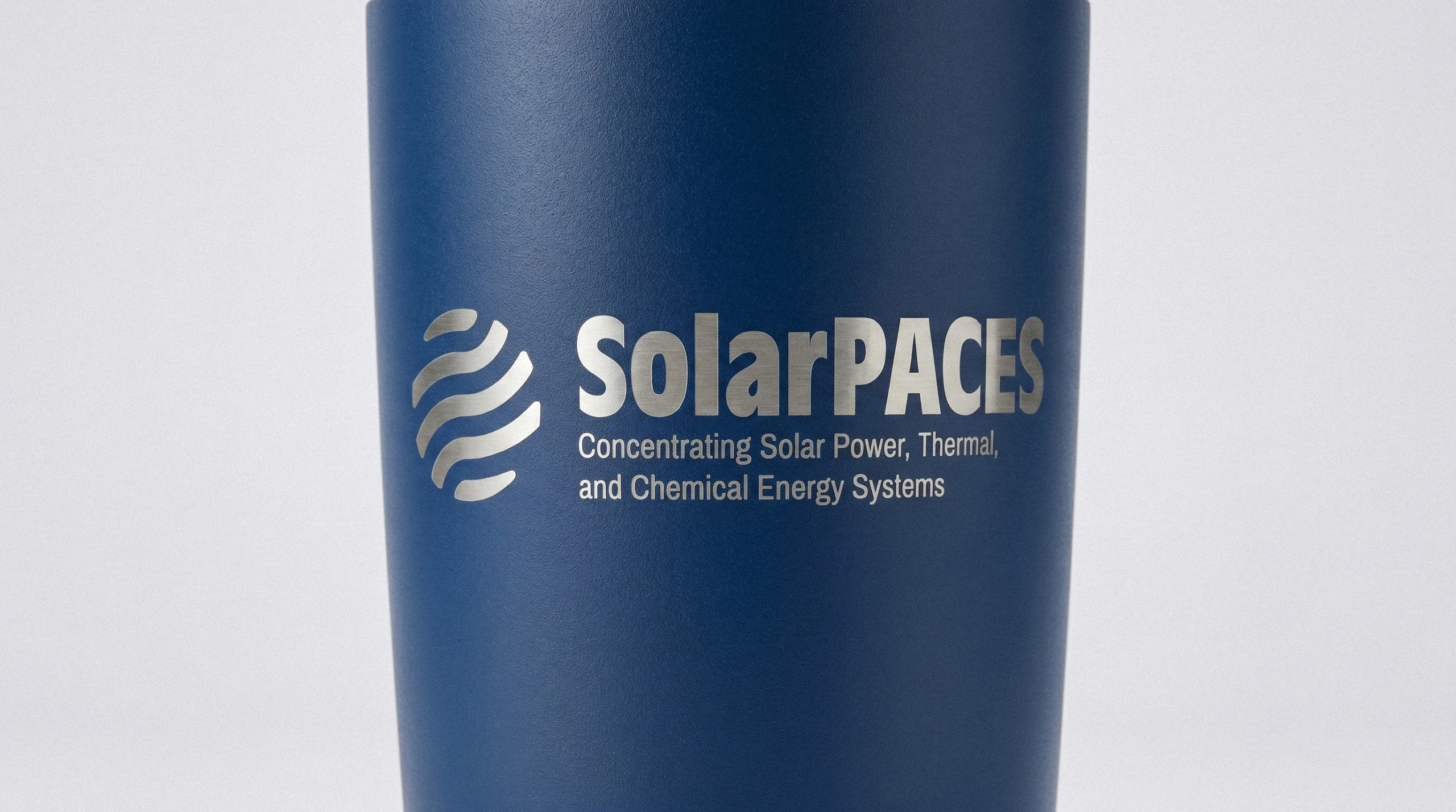 SolarPACES Tumbler – Navy with Silver Logo Navy insulated SolarPACES tumbler with the logo and descriptor printed in silver